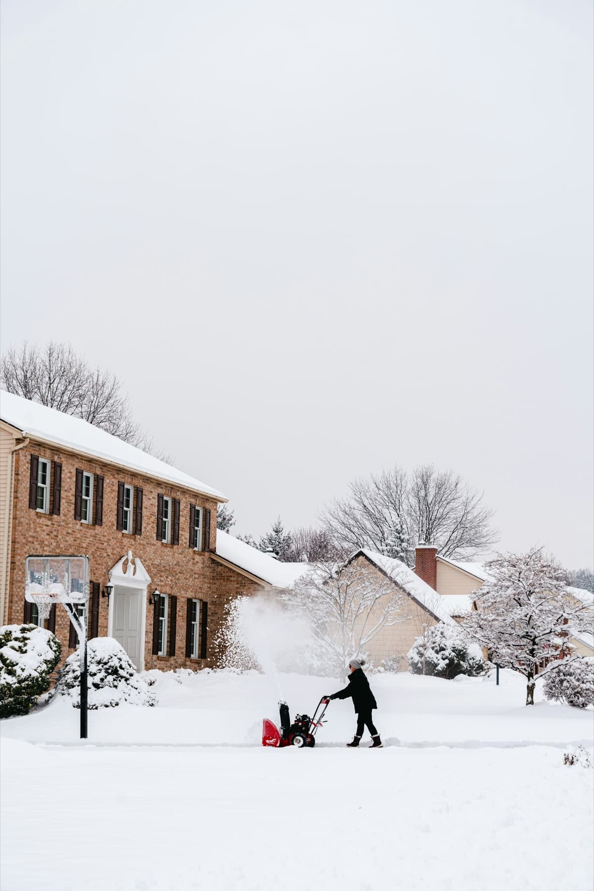 Brick house after a fresh snowfall